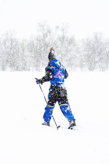 One person is cross-country skiing.