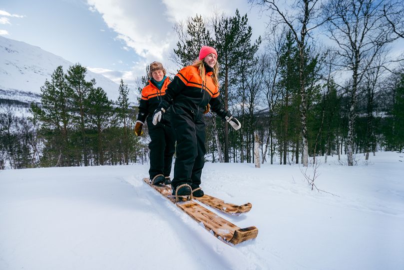 Two woman skiing