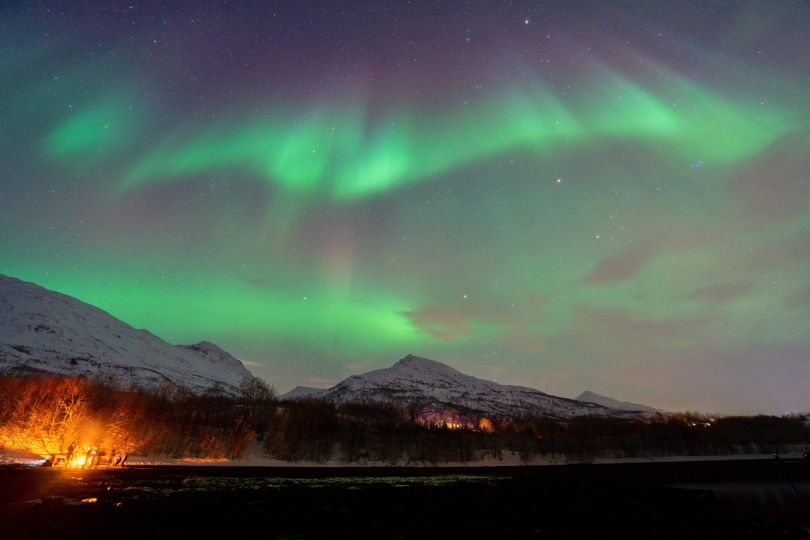 Northern lights over mountain