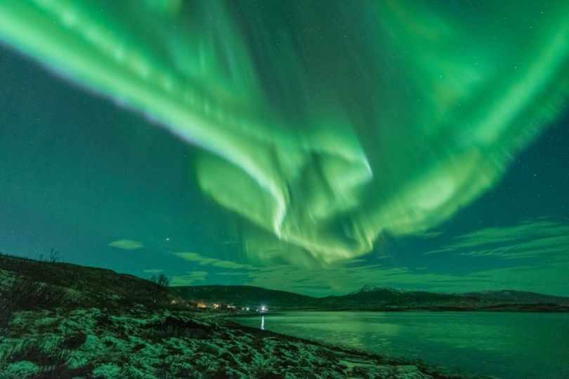 Northern lights over mountains