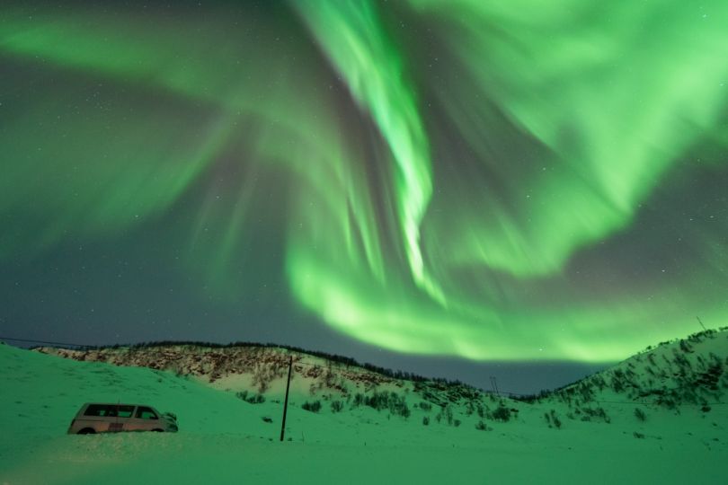 Northern lights over mountains