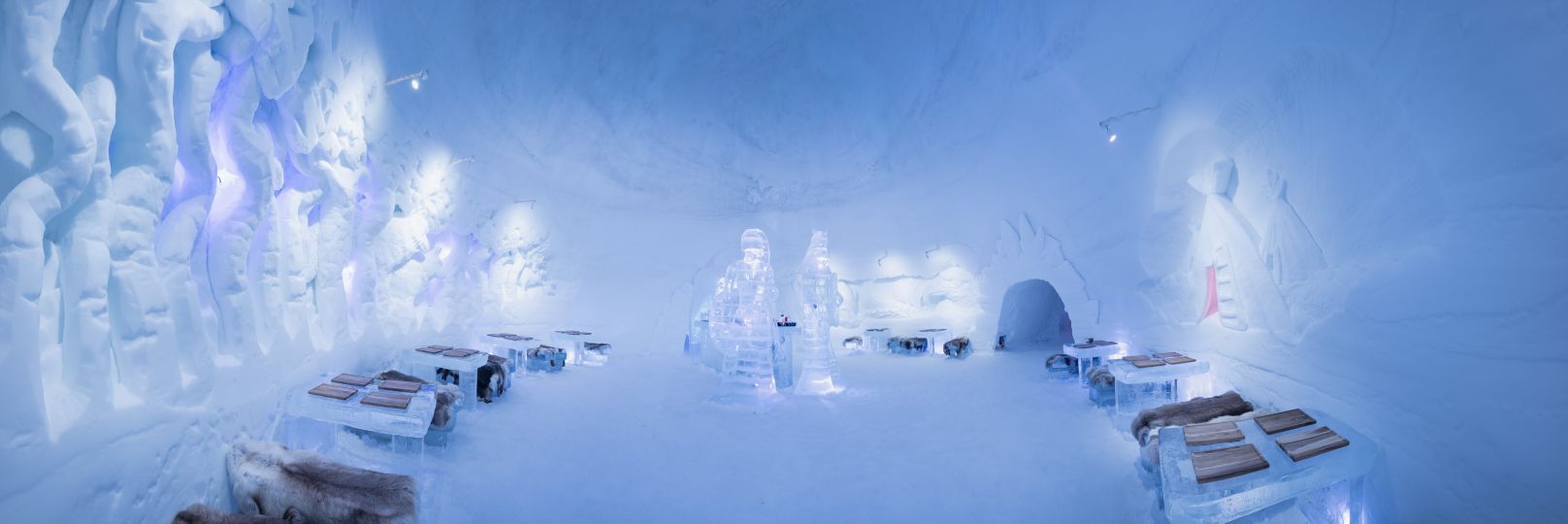 Ice sculptures and tables inside of Ice dom