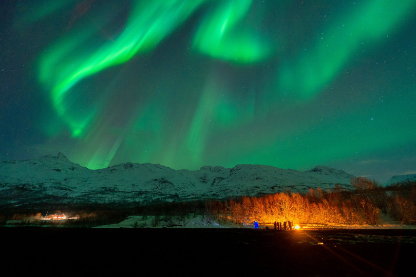 Northern lights over mountain