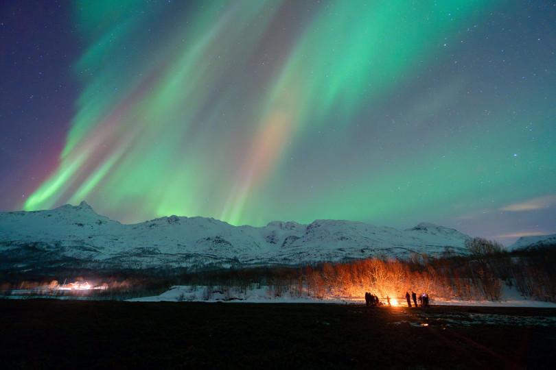 Northern lights over mountain