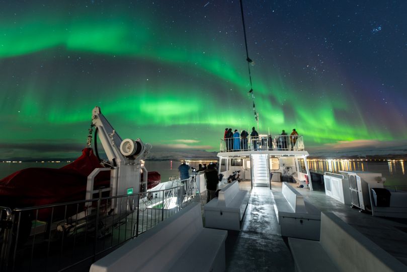 Northern lights over Rødne fjord Cruise boat, photo by David Gonzalez