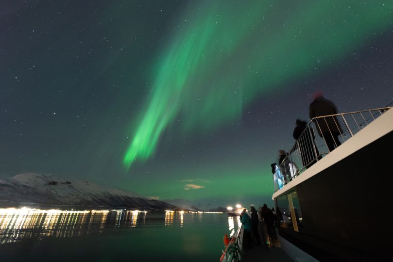 Northern lights over Rødne fjord Cruise boat, photo by David Gonzalez