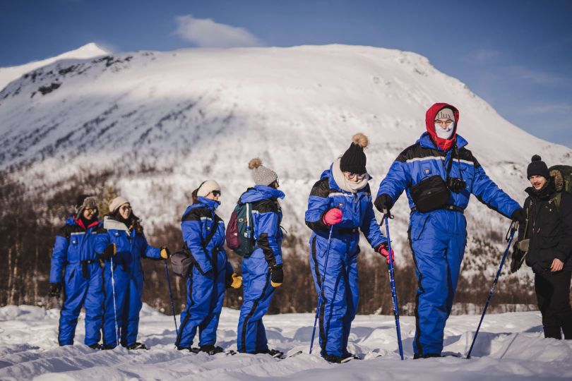 People getting ready to start their snowshoeing tour