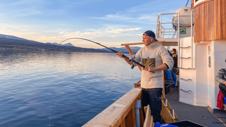 Person fishing on the boat.